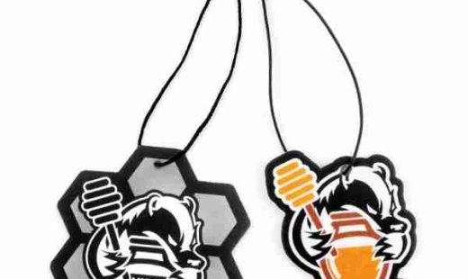 Huni Badger brand air freshener featuring cartoon honey badger character design hanging on string