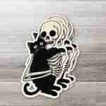 Skeleton Loving His Black Cat Sticker