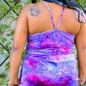 Model wearing Rolita Couture purple low-rise joggers